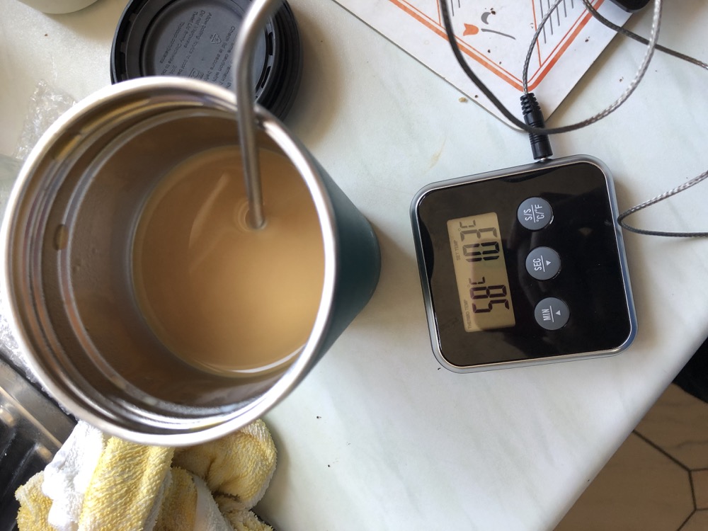 Topl Cup with milk coffee temperature